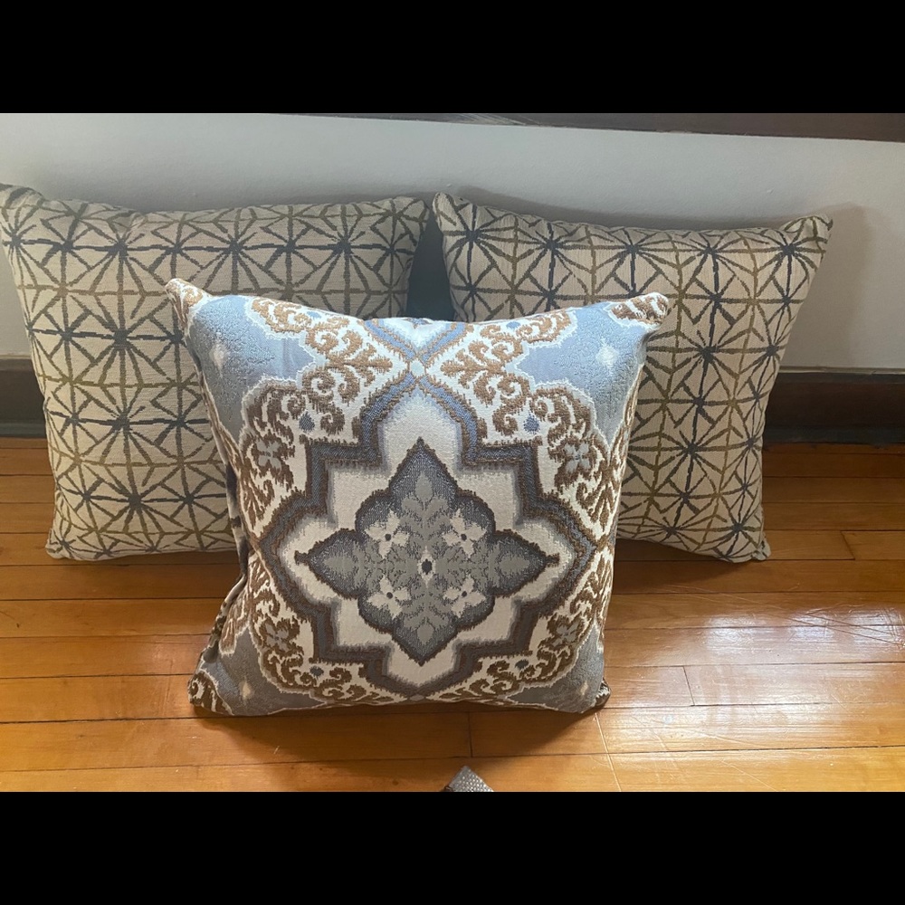 Beige accented throw pillows